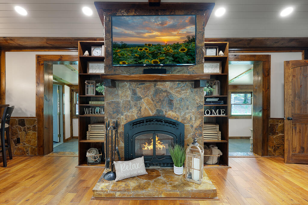 2064 Knight Road Ellijay, GA 30540 - Photo 8 of 64 Living Room, Stone Fireplace with wood-burning insert.