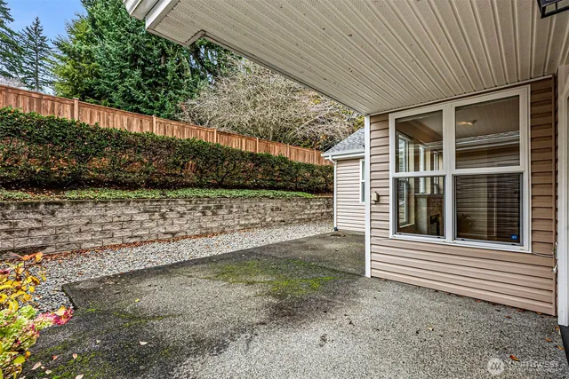 a front view of a house with a garage
