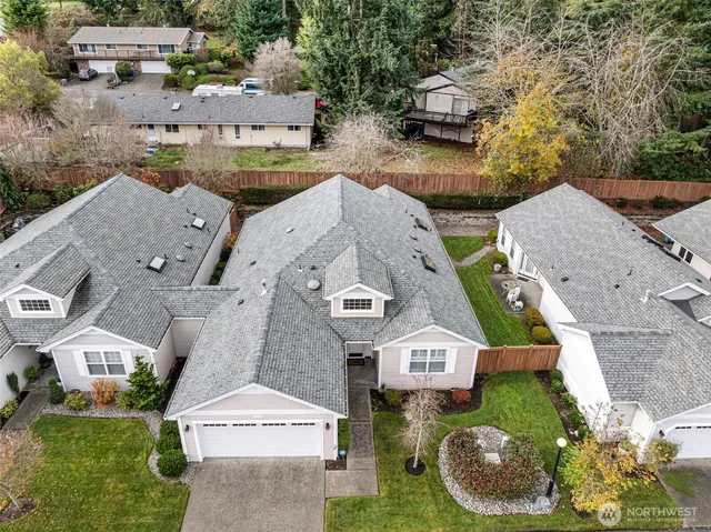 an aerial view of a house with a garden