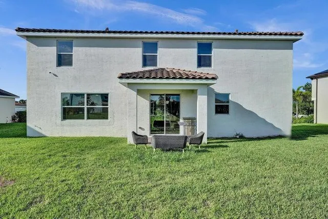 a view of outdoor space yard and front view of a house