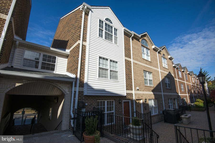 a front view of a house with parking