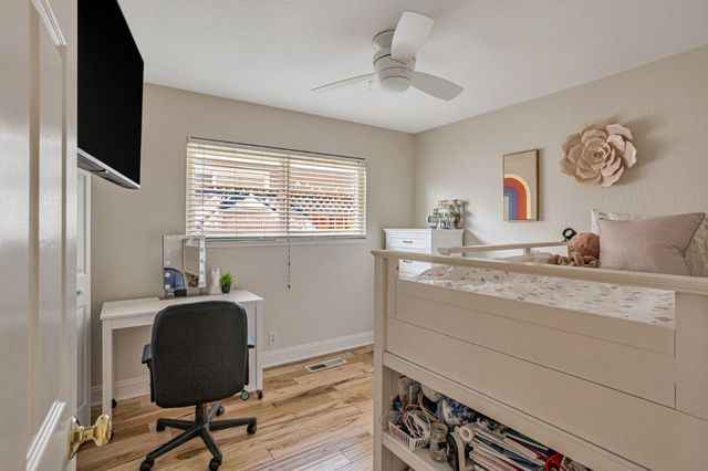 a workspace with furniture and a window