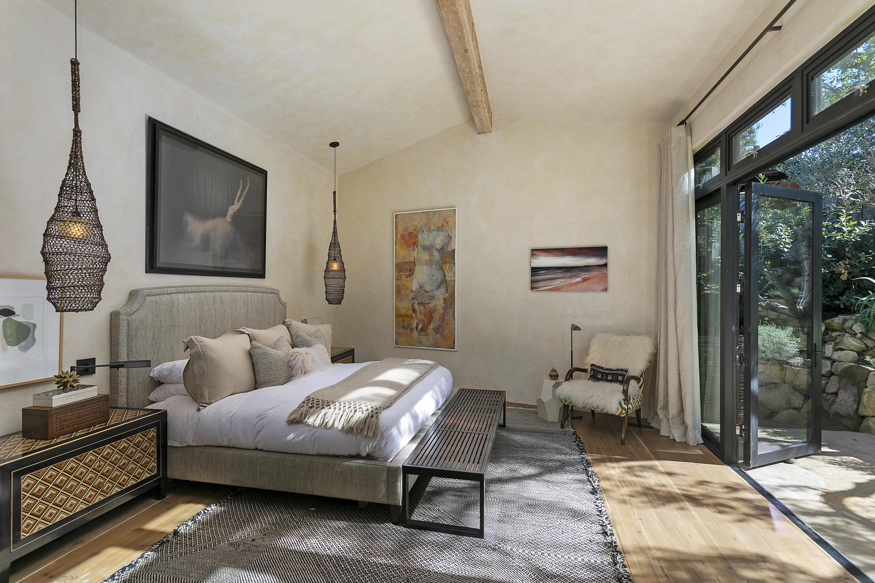 2255 Las Tunas Road Santa Barbara, CA 93103 - Photo 5 of 9 a bedroom with a bed a lamp and large window