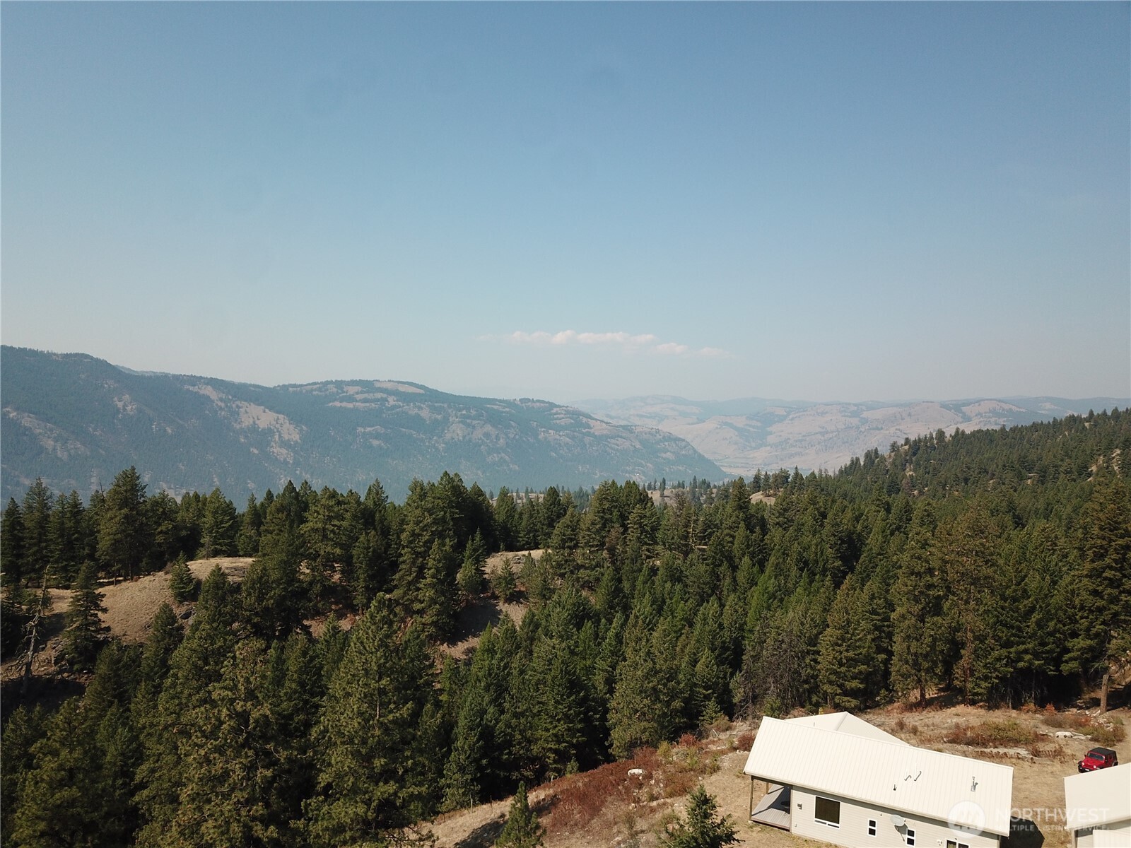 167 Excelsior Way Curlew, WA 99118 - Photo 30 of 37 a view of a city with mountain