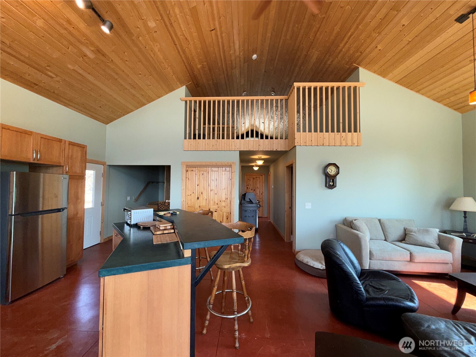 167 Excelsior Way Curlew, WA 99118 - Photo 6 of 37 a dining room with furniture and wooden floor