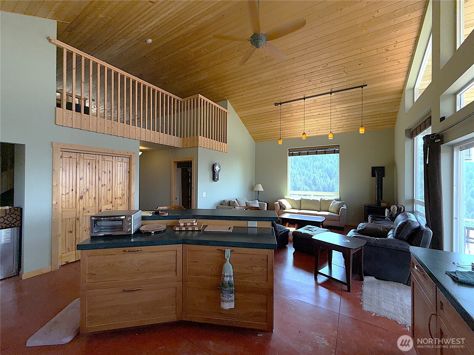 167 Excelsior Way Curlew, WA 99118 - Photo 7 of 37 a living room with furniture window and wooden floor