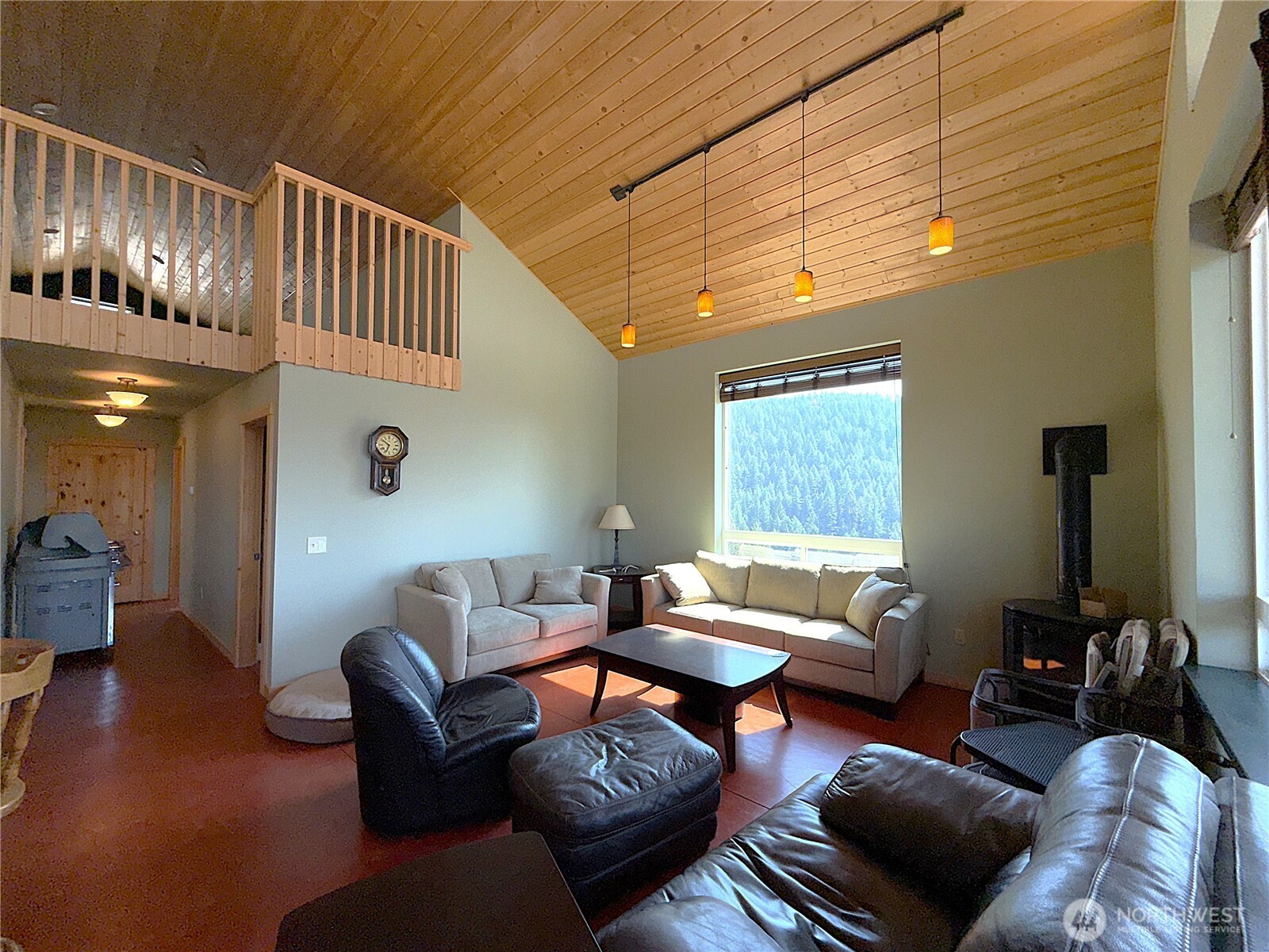 167 Excelsior Way Curlew, WA 99118 - Photo 9 of 37 a living room with furniture and a window