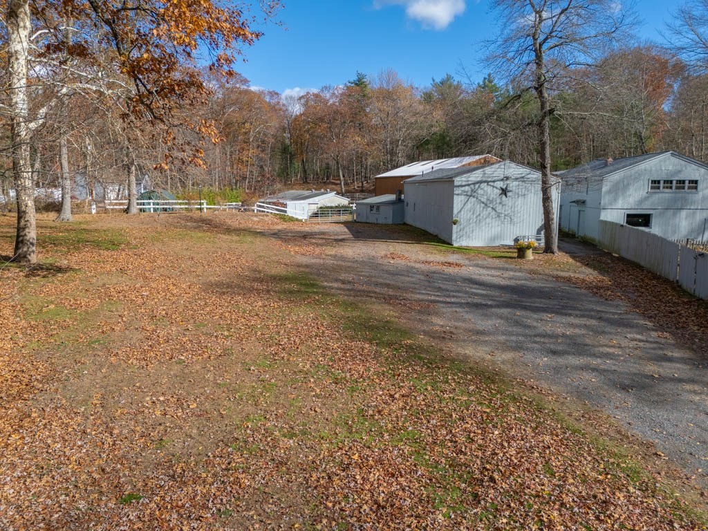 219-221 Peeptoad Road Scituate, RI 02857 - Photo 7 of 16 a view of a road with a building