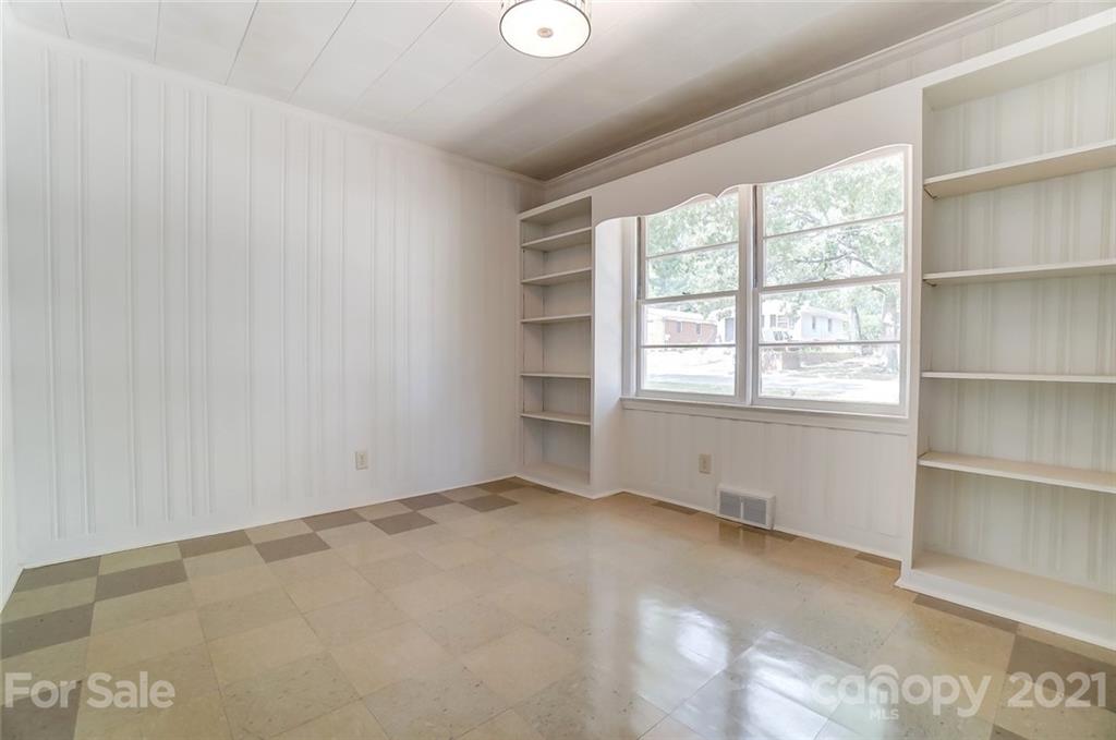 201 Lydia Street Monroe, NC 28110 - Photo 11 of 39 a view of an empty room with a window