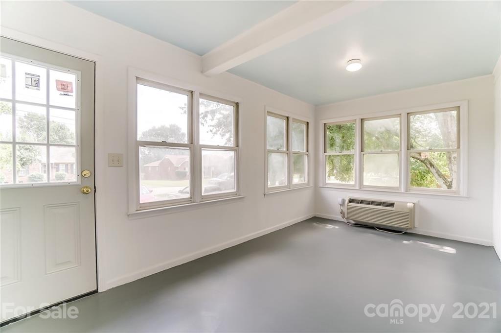 201 Lydia Street Monroe, NC 28110 - Photo 14 of 39 an empty room with windows