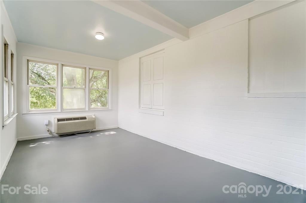201 Lydia Street Monroe, NC 28110 - Photo 16 of 39 a view of an empty room with a window