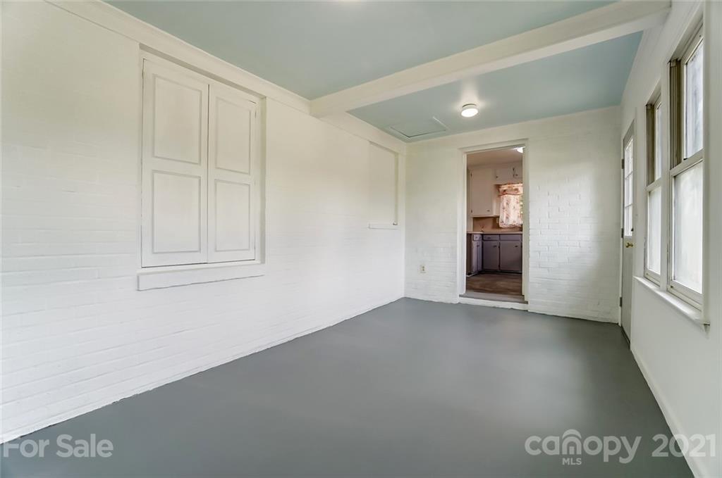 201 Lydia Street Monroe, NC 28110 - Photo 18 of 39 an empty room with windows