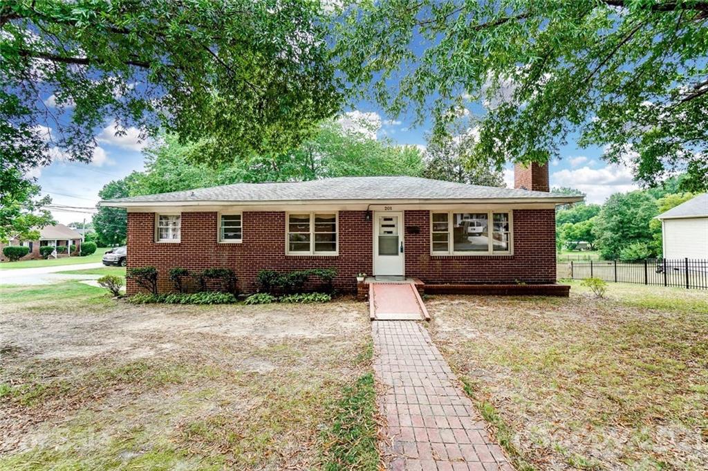 201 Lydia Street Monroe, NC 28110 - Photo 3 of 39 front view of a house with a yard