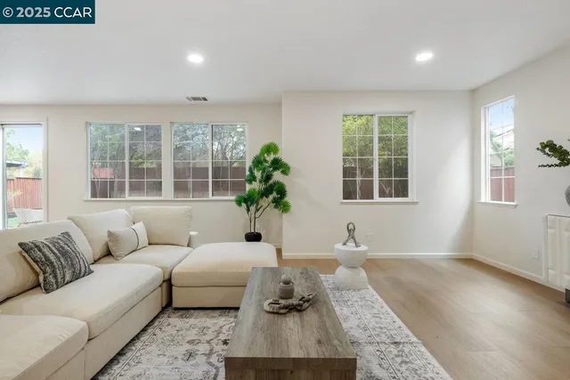 a bedroom with a bed and a fireplace