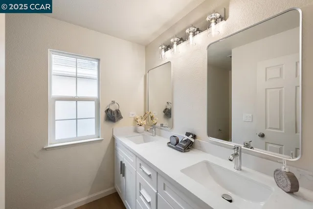 a bathroom with a bathtub a toilet and a shower