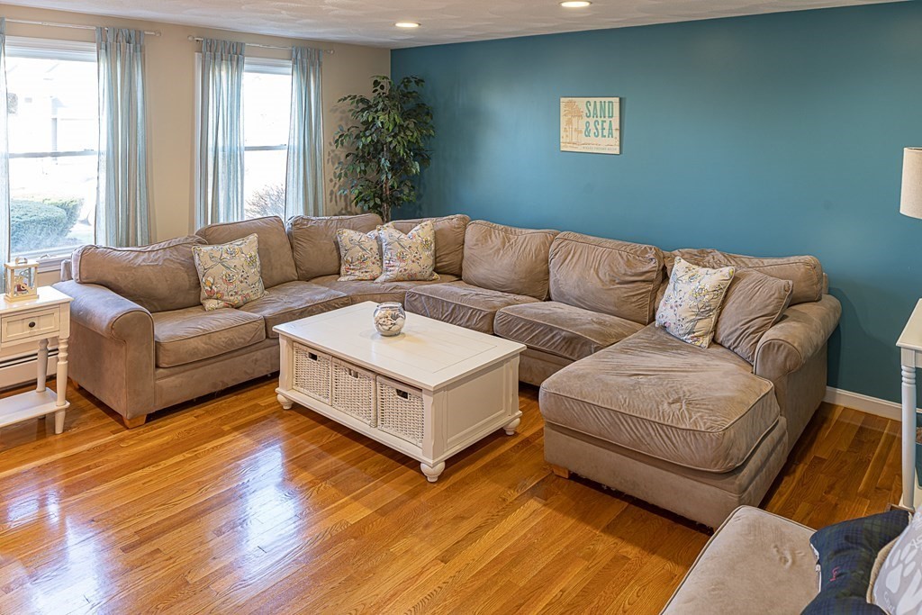 66 Mountwood Road Swampscott, MA 01907 - Photo 11 of 29 a living room with furniture and a large window