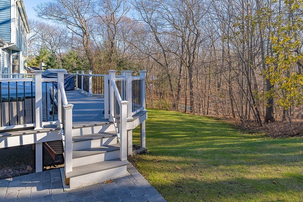 66 Mountwood Road Swampscott, MA 01907 - Photo 27 of 29 a view of a backyard with wooden fence