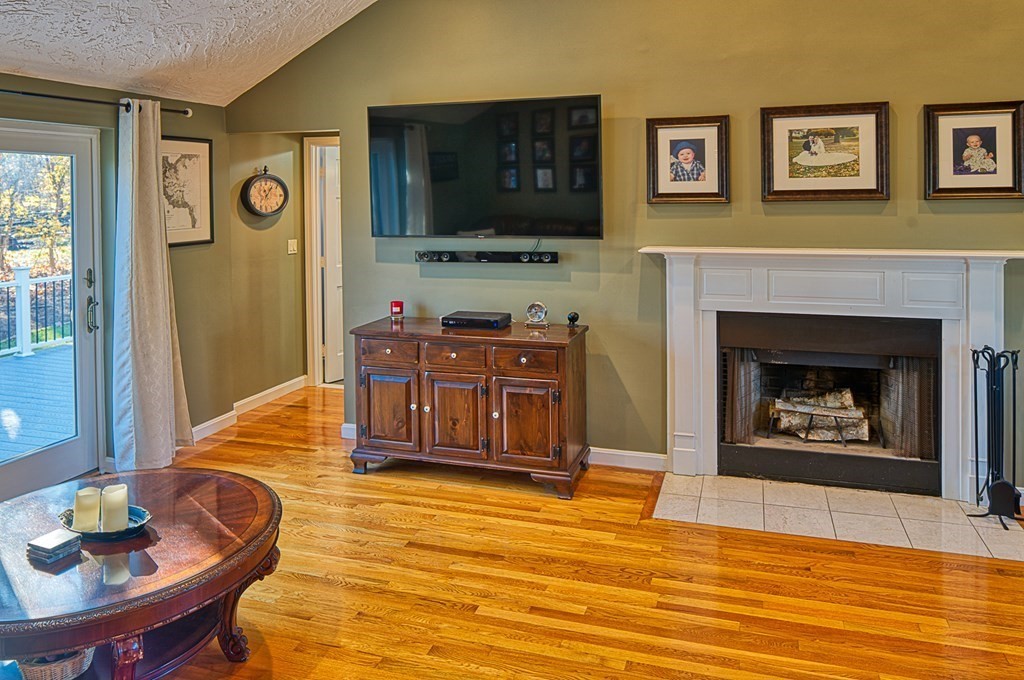 66 Mountwood Road Swampscott, MA 01907 - Photo 4 of 29 a living room with furniture and a fireplace