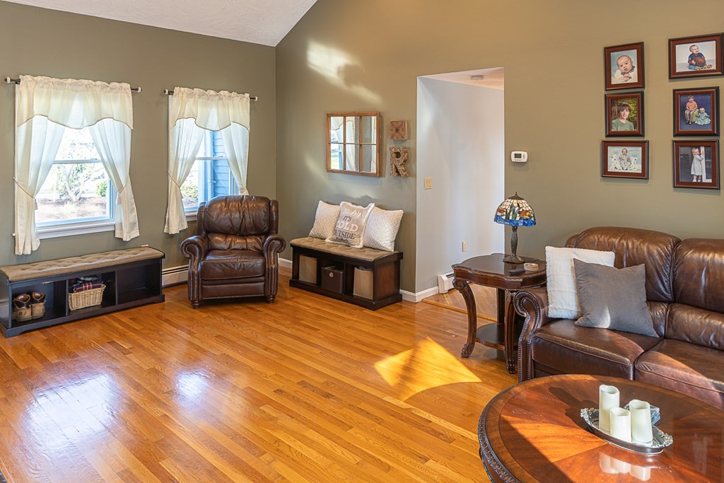 66 Mountwood Road Swampscott, MA 01907 - Photo 7 of 29 a living room with furniture and a flat screen tv