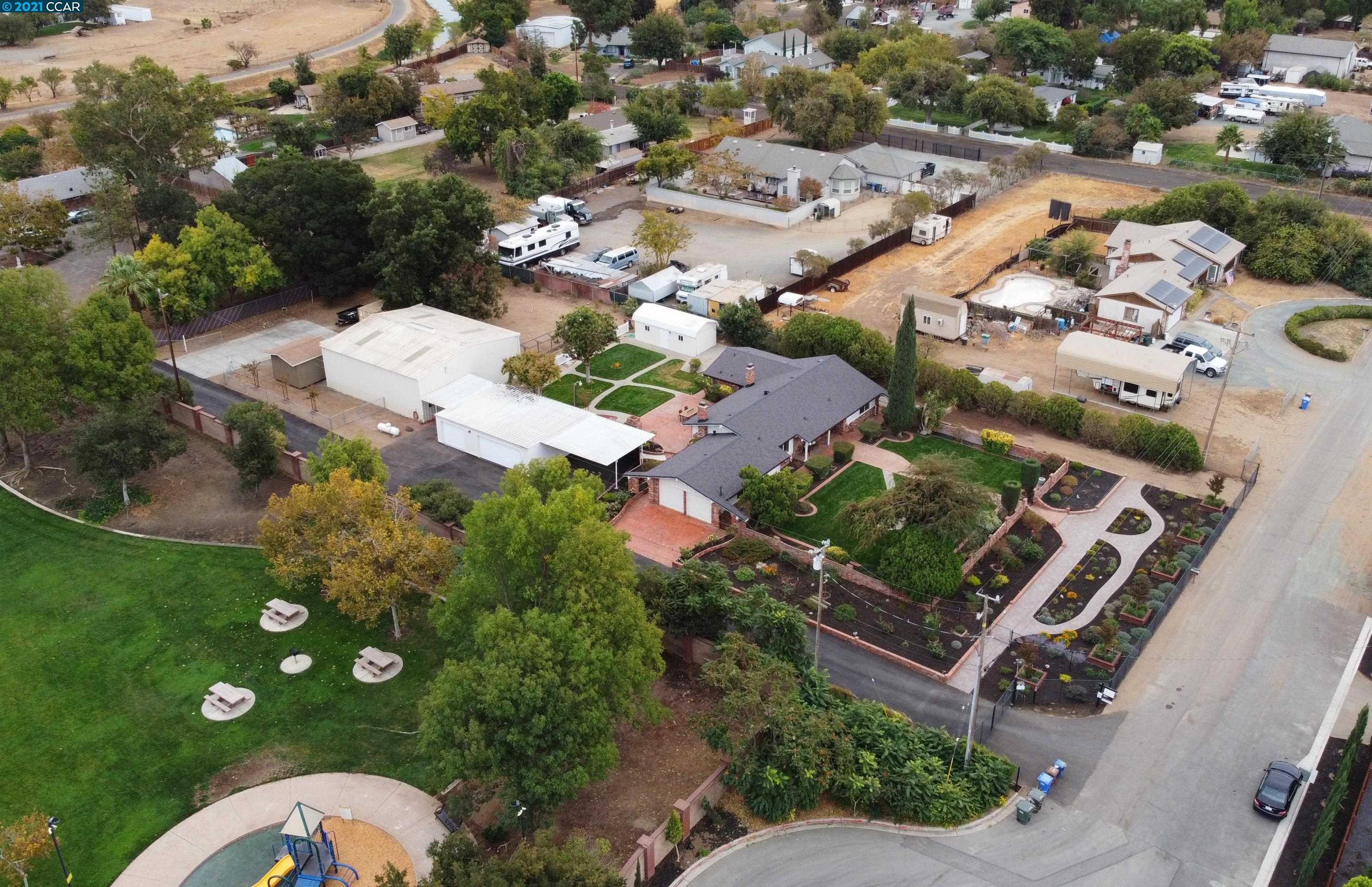 3340 Doyle Road Oakley, CA 94561 - Photo 1 of 1 an aerial view of a house with garden space and street view