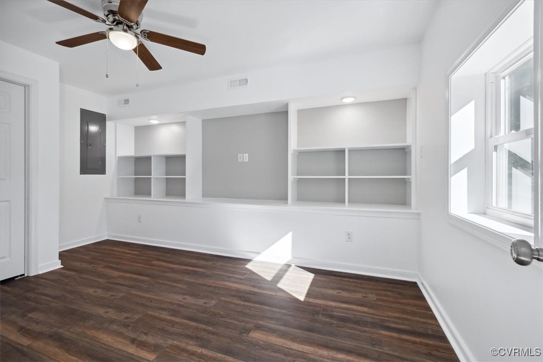 87 Proffits Road Louisa, VA 23093 - Photo 23 of 33 a view of an empty room with wooden floor and a window
