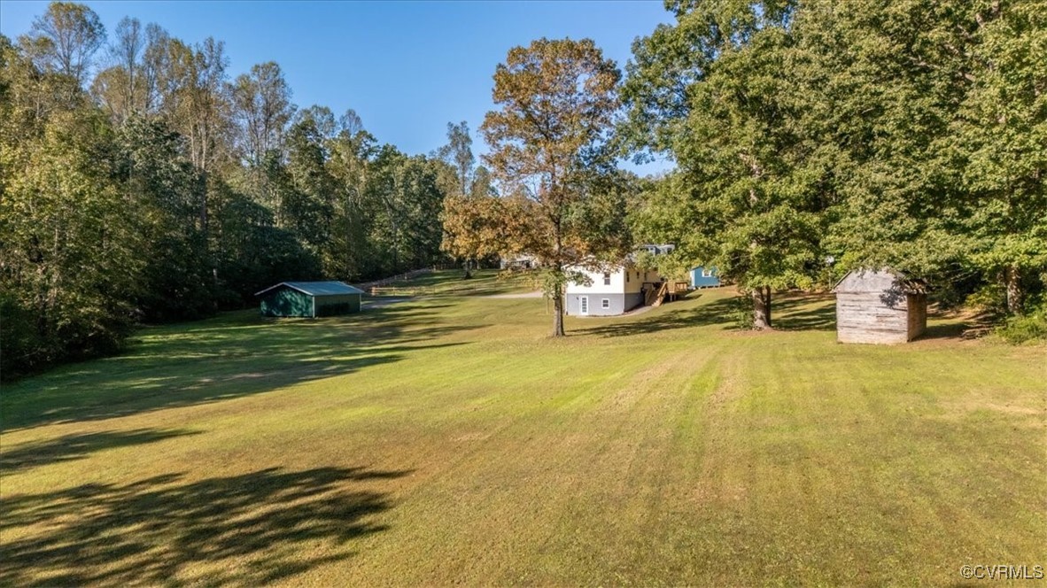 87 Proffits Road Louisa, VA 23093 - Photo 28 of 33 a view of a swimming pool with an outdoor space and seating area