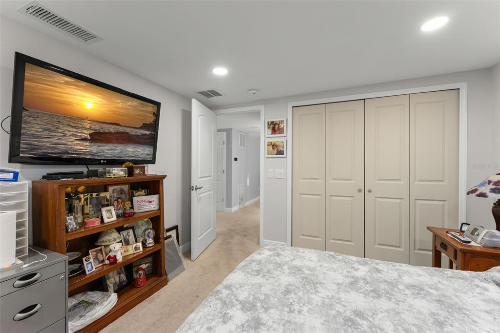 16838 Old Highway 50 East Clermont, FL 34711 - Photo 13 of 51 a room with wooden floor and furniture