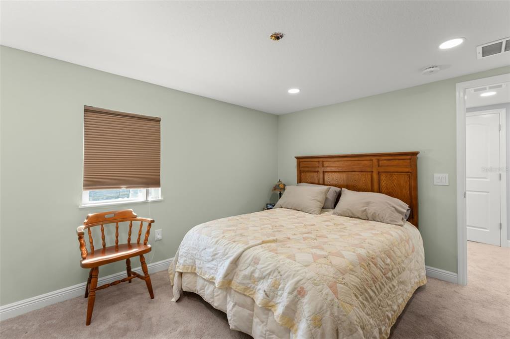 16838 Old Highway 50 East Clermont, FL 34711 - Photo 16 of 51 a bedroom with a bed and a window