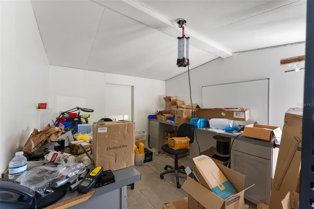16838 Old Highway 50 East Clermont, FL 34711 - Photo 26 of 51 a work room with furniture and gym equipment