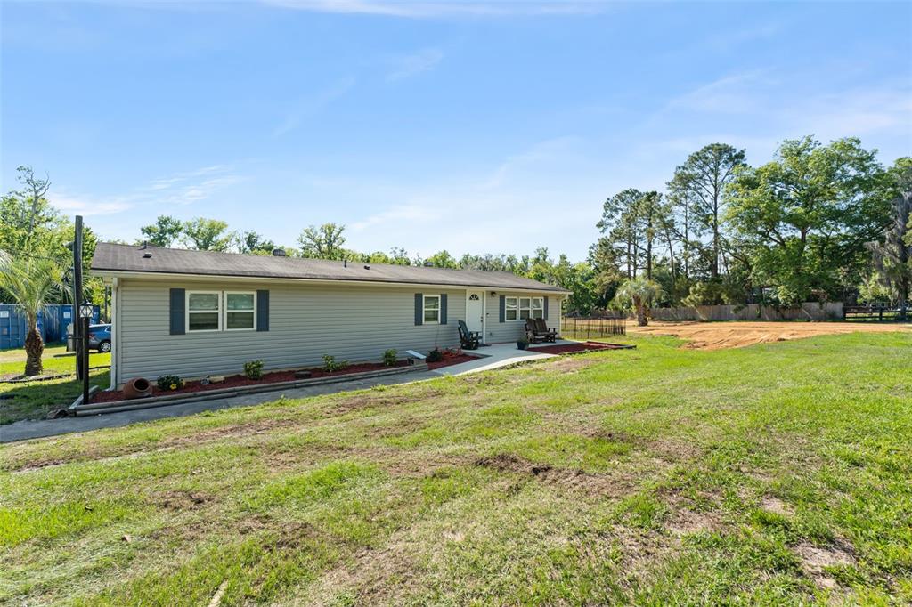 16838 Old Highway 50 East Clermont, FL 34711 - Photo 28 of 51 a view of an house with backyard space and balcony