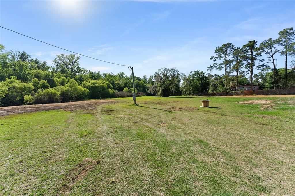 16838 Old Highway 50 East Clermont, FL 34711 - Photo 30 of 51 a view of a field with an outdoor space