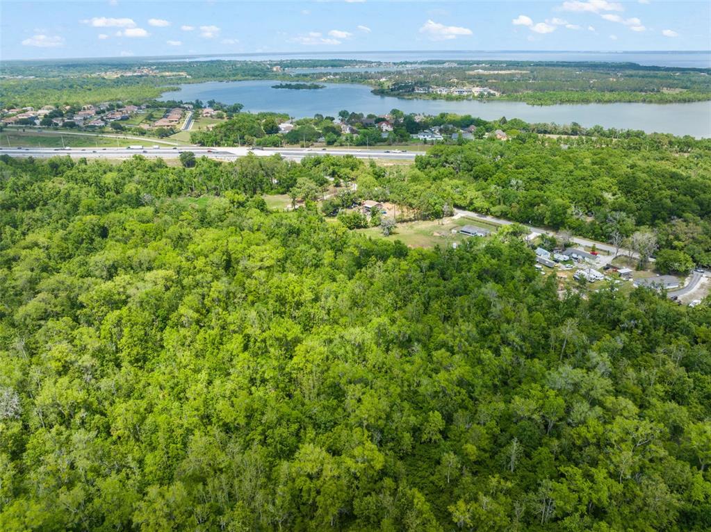 16838 Old Highway 50 East Clermont, FL 34711 - Photo 44 of 51 a view of a city with lush green forest