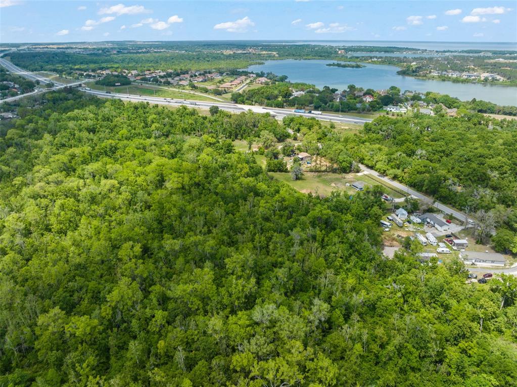 16838 Old Highway 50 East Clermont, FL 34711 - Photo 46 of 51 a view of a city with lush green forest