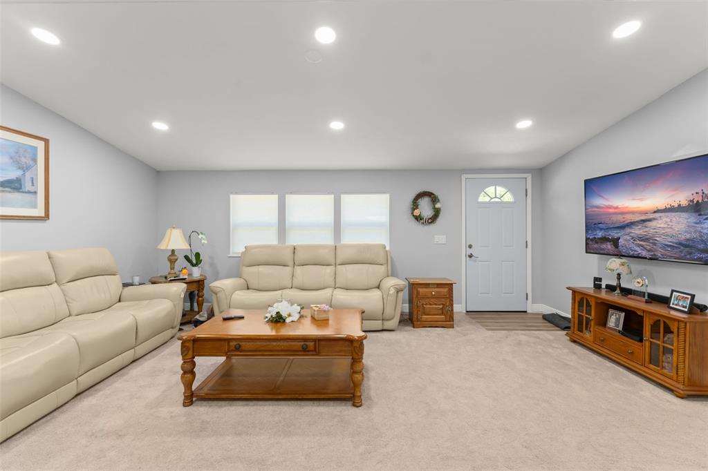 16838 Old Highway 50 East Clermont, FL 34711 - Photo 7 of 51 a living room with furniture and a flat screen tv