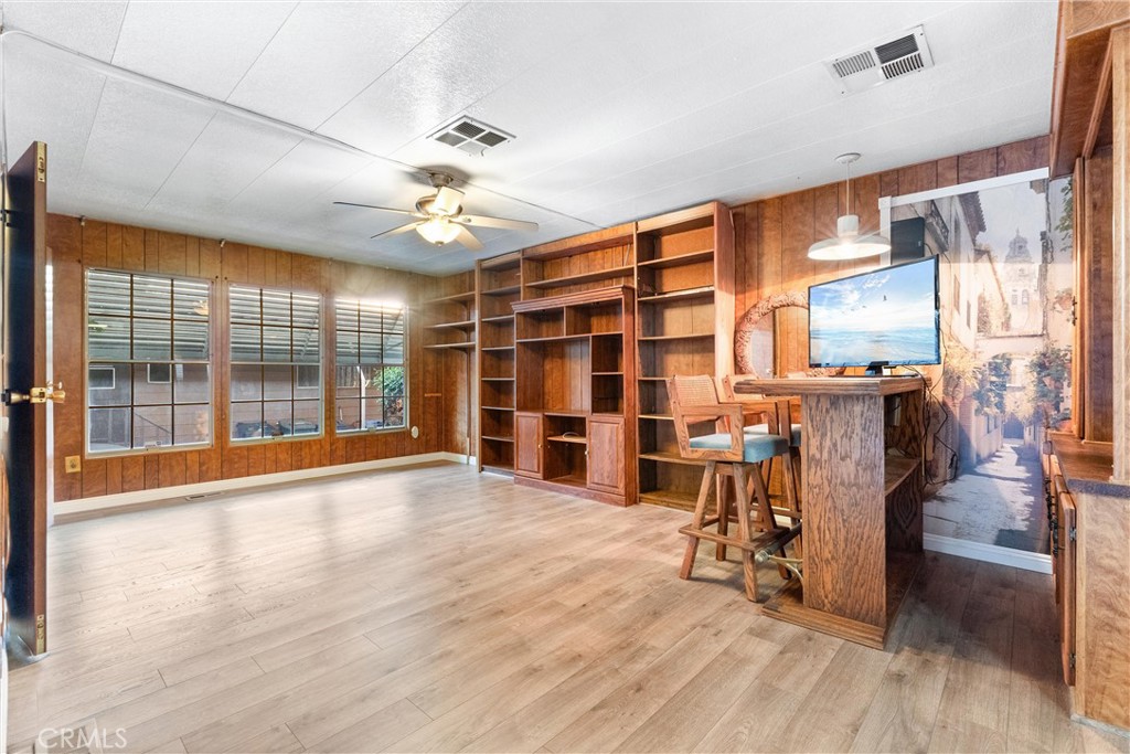 1400 South Sunkist, Unit 80 Anaheim, CA 92806 - Photo 2 of 48 a view of a livingroom with furniture and a ceiling fan