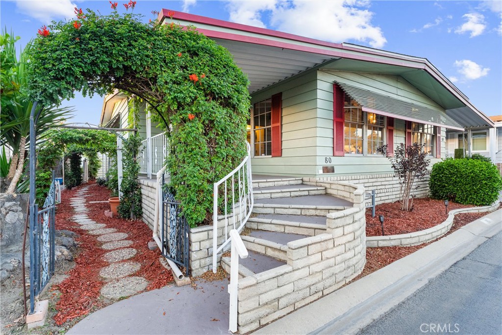 1400 South Sunkist, Unit 80 Anaheim, CA 92806 - Photo 7 of 48 a view of a house with backyard and sitting area