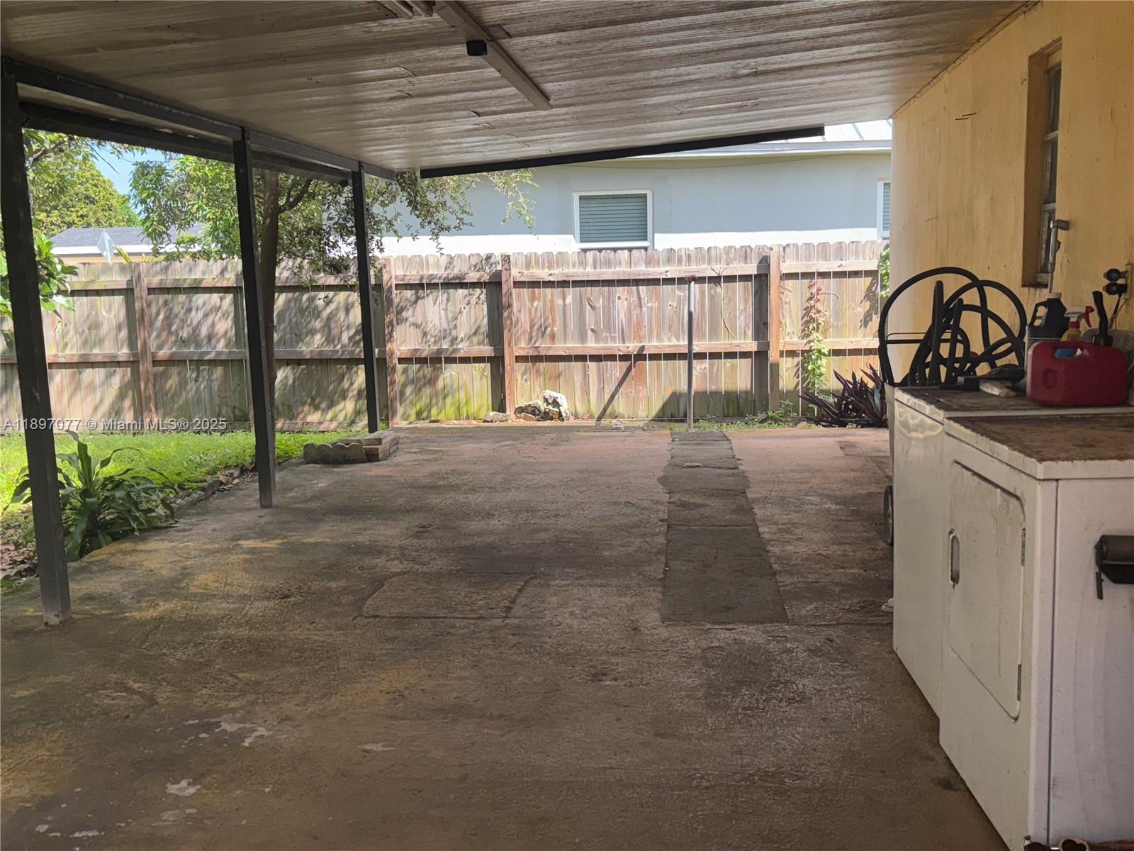 6261 Southwest 6th Street Miami, FL 33144 - Photo 17 of 29 a view of a hallway with a large window