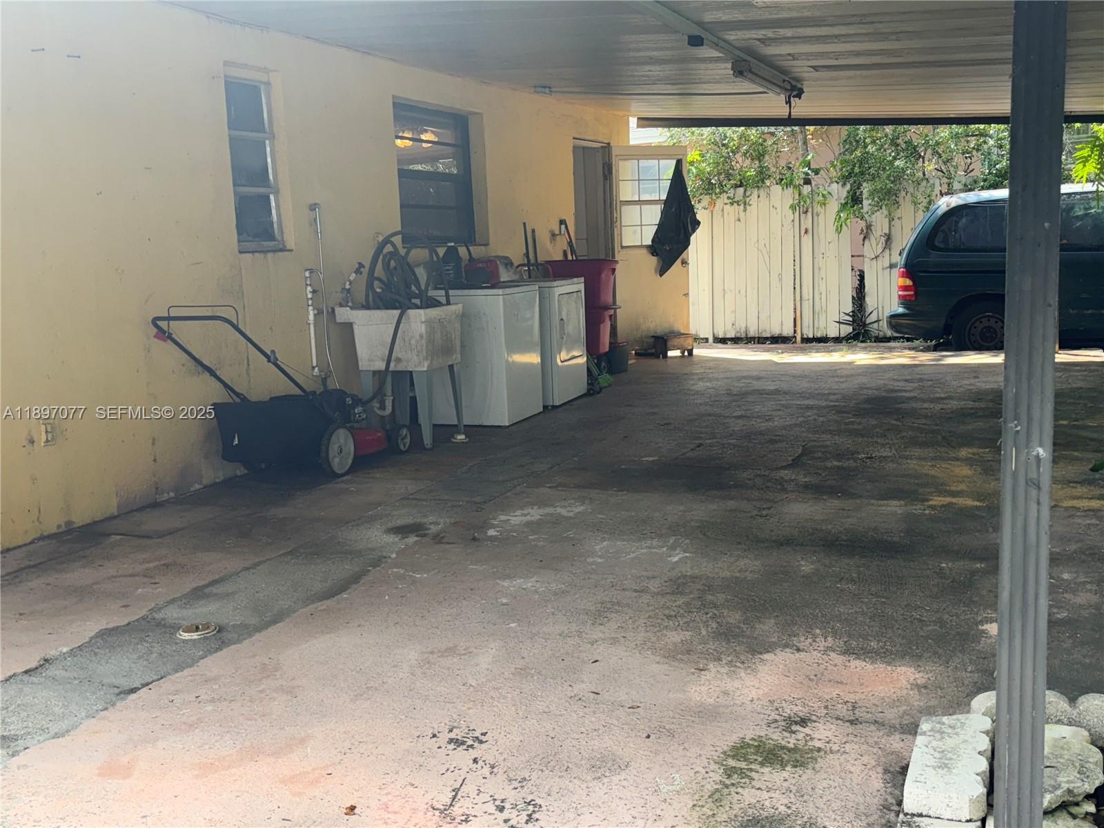 6261 Southwest 6th Street Miami, FL 33144 - Photo 18 of 29 a view of a porch with furniture