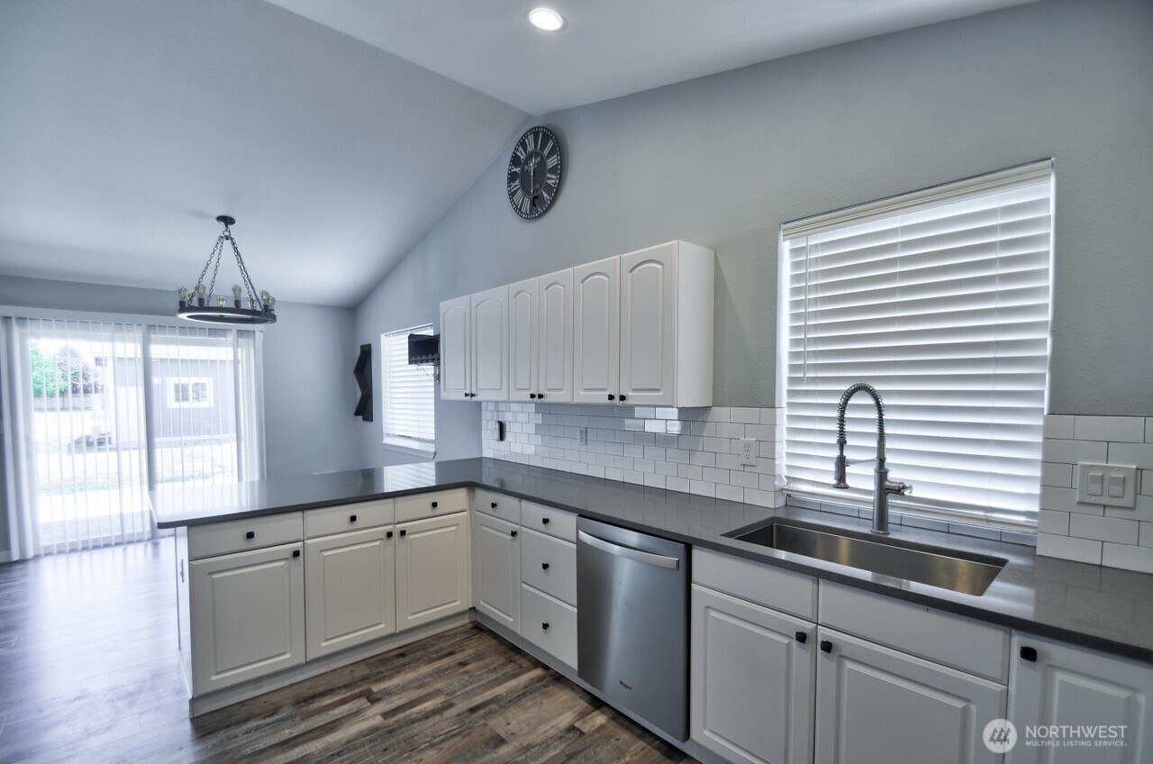 8603 194th Avenue Southwest Rochester, WA 98579 - Photo 12 of 32 a kitchen with a sink cabinets and window