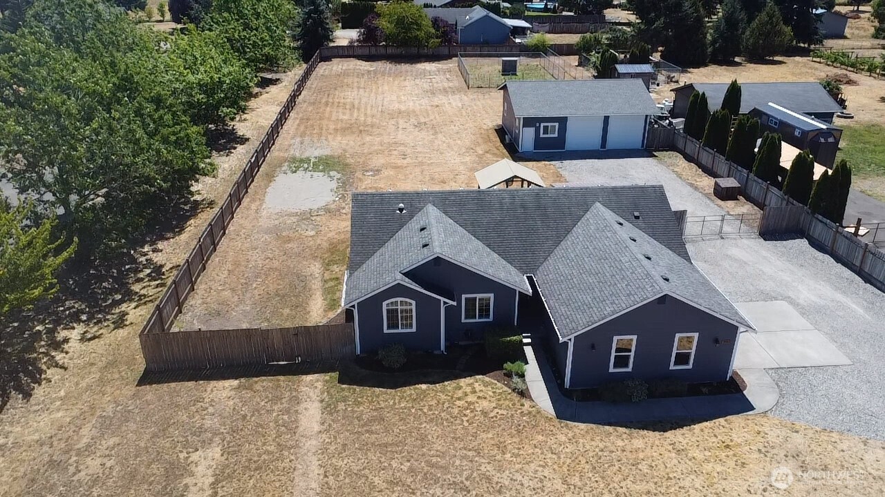 8603 194th Avenue Southwest Rochester, WA 98579 - Photo 30 of 32 a view of a house with a yard