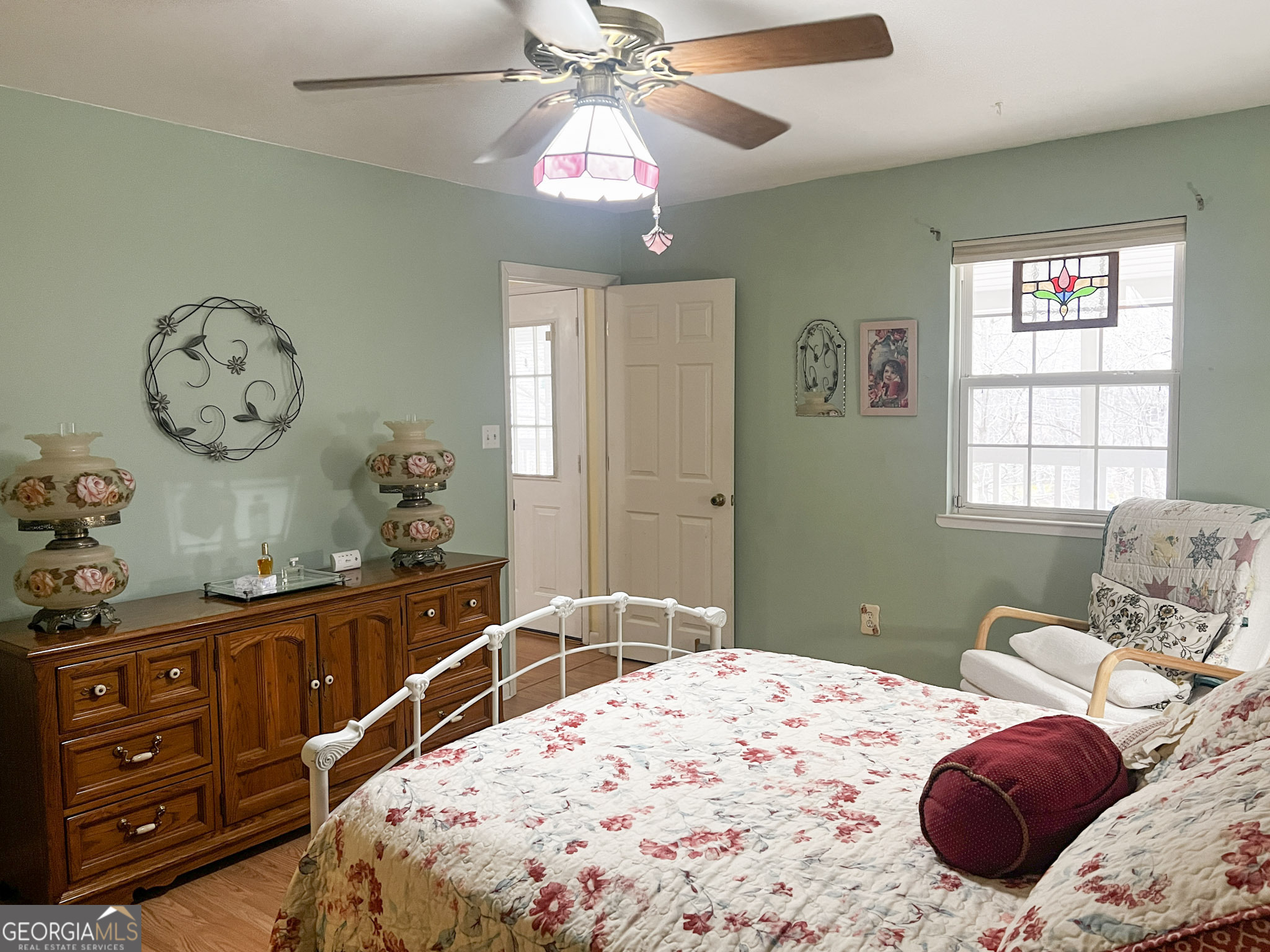 153 View Street Clarkesville, GA 30523 - Photo 12 of 31 a bedroom with a bed and wooden floor