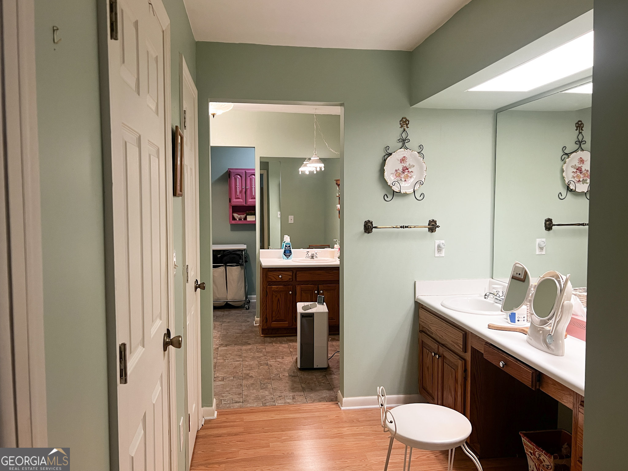 153 View Street Clarkesville, GA 30523 - Photo 13 of 31 a bathroom with a sink a toilet and a mirror