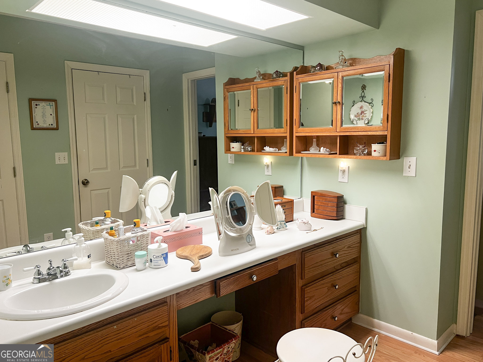 153 View Street Clarkesville, GA 30523 - Photo 14 of 31 a bathroom with a sink and a mirror