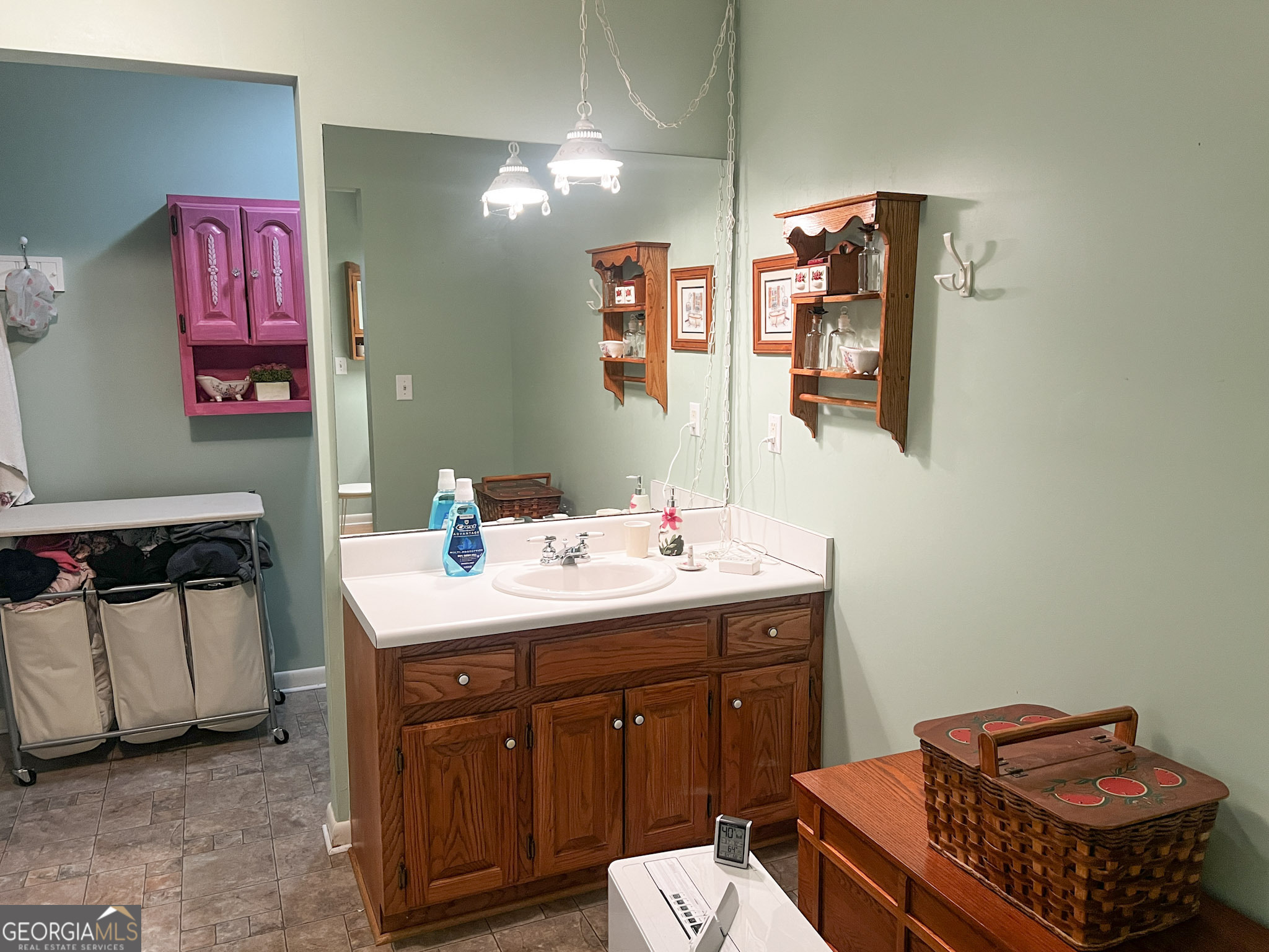 153 View Street Clarkesville, GA 30523 - Photo 15 of 31 a bathroom with a sink vanity mirror and toilet