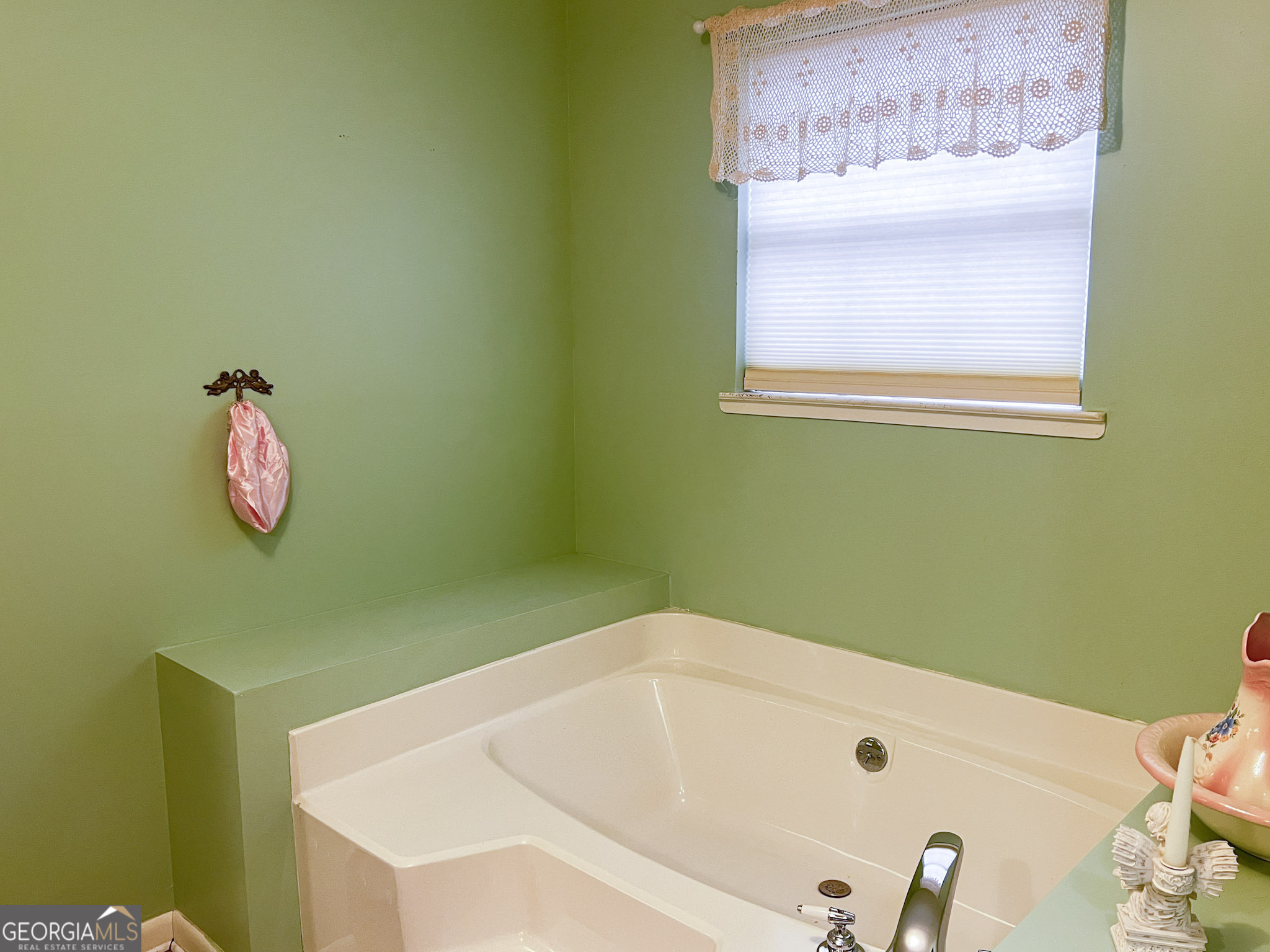 153 View Street Clarkesville, GA 30523 - Photo 17 of 31 a bathroom with a tub and a window