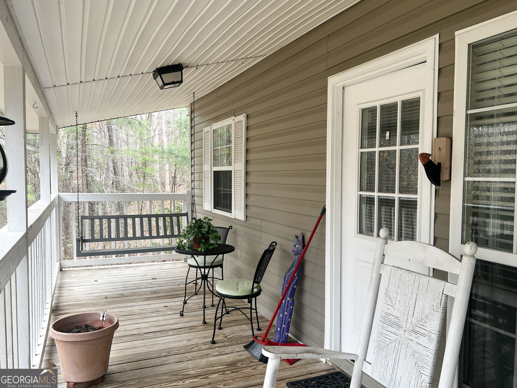 153 View Street Clarkesville, GA 30523 - Photo 26 of 31 a view of a balcony with chair and front door