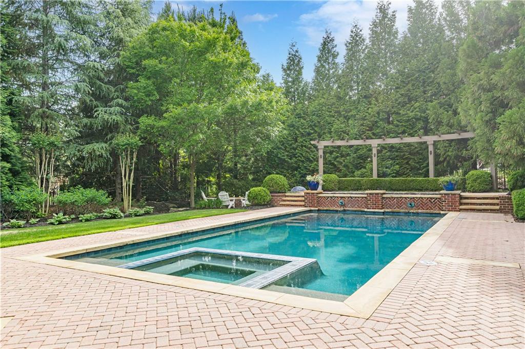 2010 Caladium Way Roswell, GA 30075 - Photo 63 of 71 a view of a swimming pool with a patio