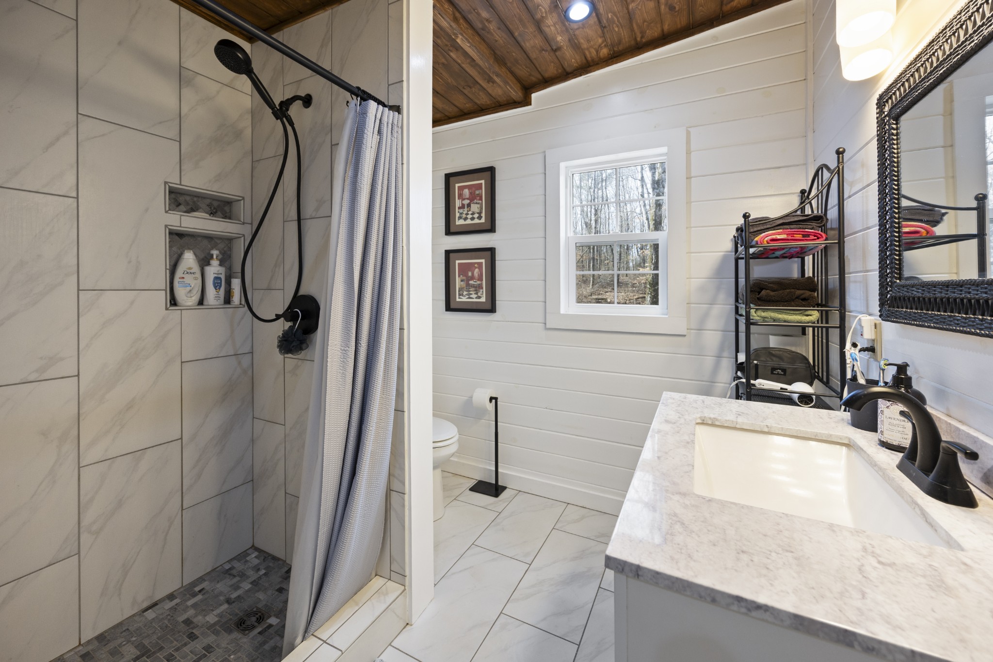 1085 Henegar Road Morrison, TN 37357 - Photo 5 of 17 a bathroom with a sink a toilet and shower