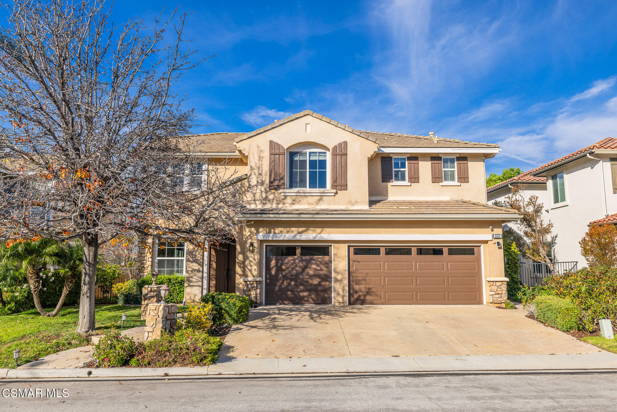5353 Willow Oak Street Simi Valley, CA 93063 - Photo 1 of 52 a front view of a house with a garden
