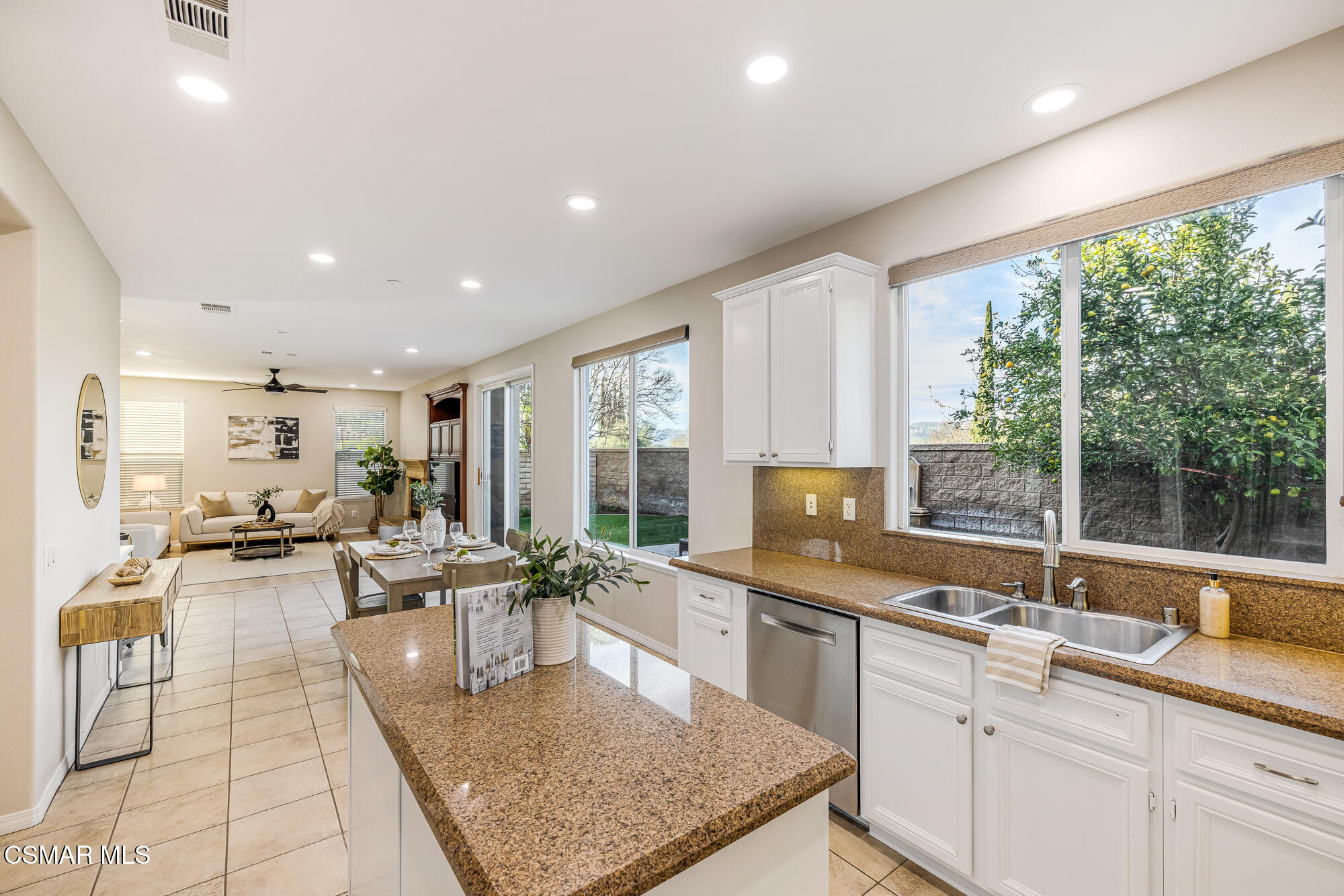 5353 Willow Oak Street Simi Valley, CA 93063 - Photo 14 of 52 a large kitchen with lots of counter top space and stainless steel appliances